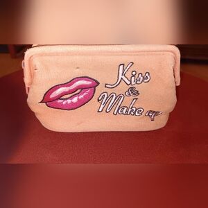 Peach Cosmetic Bag with Red Lips Design